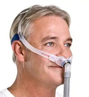 Resmed Swift Fx Nasal Pillow CPAP Mask With Headgear Fit Pack on Model - Side View