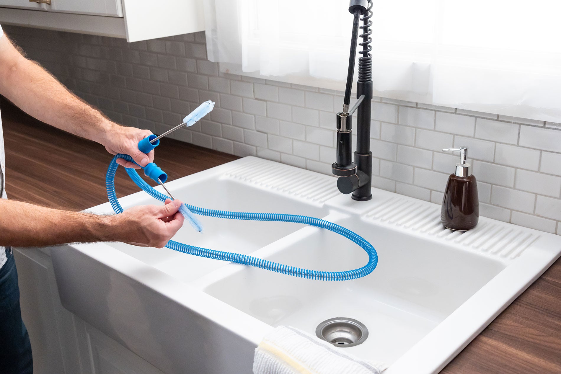 Hose Brush Set-Brush in Use (Blue & Sink view)