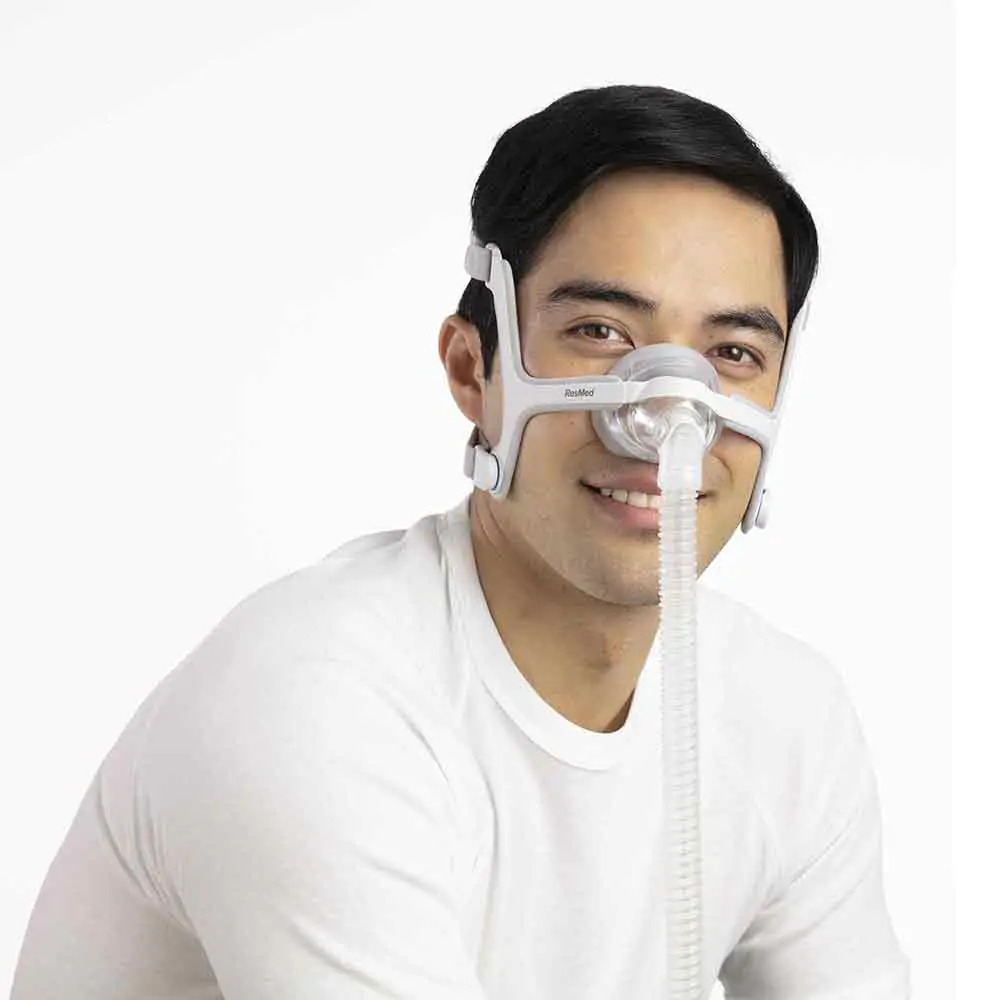 Product Image ResMed AirTouch N20 Nasal CPAP Mask with Headgear on Person