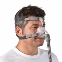 ResMed Mirage FX Nasal CPAP Mask with Headgear on Man thumbnail